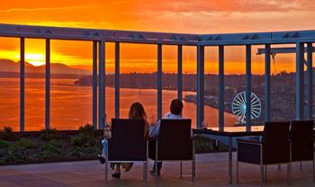 Rooftop Decks with Grills, Fire Pits, and Views of Mount Rainier, Lumen Field, Puget Sound, and Downtown Seattle